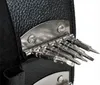 A close-up view of a black leather case with multiple small screwdriver bits attached to a metal plate. Náhled obrázku produktu