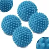 Four blue dryer balls with nubs are arranged on a white background. Produktbild-Vorschau