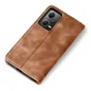 A brown leather flip case for a smartphone is shown against a white background. Produktbild-Vorschau