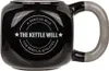 A black mug with a gray handle, featuring a circular logo with text. Podgląd zdjęcia produktu
