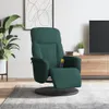 A dark green velvet massage chair with a footrest is shown in a living room setting, next to a plant and a TV stand. Produktbild-Vorschau