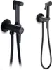 Two black bidet sprayers mounted on a white background. Podgląd zdjęcia produktu