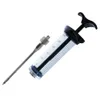 A meat injector syringe and needle are shown against a white background. Náhled obrázku produktu