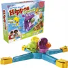 A product shot of the Hungry Hippos Launchers board game, showing both the game box and the game board with hippos. Produktbild-Vorschau