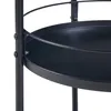A close-up view of a black metal serving cart with two shelves. Voir les images du produit