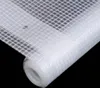 A roll of white grid-like fabric on a black background. Produktbild-Vorschau