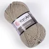A ball of beige yarn with a label. Produktbild-Vorschau