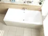 A white bathtub in a bathroom setting with tiled walls and floor. Produktbild-Vorschau