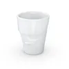 A white ceramic mug with a face design. Náhľad obrázku produktu