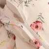 A close-up view of a floral patterned duvet cover with a zipper partially open. Náhľad obrázku produktu