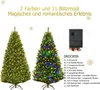 Two artificial Christmas trees are shown, one with yellow lights and the other with multi-colored lights. A close-up of a control box for the lights is also visible, along with a list of lighting modes. Produktbild-Vorschau