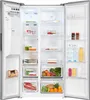 An open refrigerator with food items organized on shelves and in drawers. Podgląd zdjęcia produktu