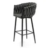 A gray bar stool with a braided backrest and black legs is shown against a white background. Podgląd zdjęcia produktu