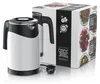 A product shot of a white and black electric kettle next to its packaging box. Náhled obrázku produktu
