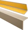 Two L-shaped corner profiles, one with yellow adhesive backing visible. Náhled obrázku produktu