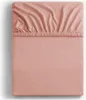 A top-down view of a peach-colored fitted sheet, folded and laid flat. Produktbild-Vorschau