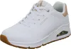 A white Skechers sneaker with tan accents. Anteprima dell’immagine prodotto