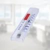 A thermometer is shown against a blurred background that appears to be an indoor setting. Produktbild-Vorschau