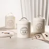 HOMLA Pojemniki RIO z metalową pokrywką beżowe 3 szt. Podgląd zdjęcia produktu 5