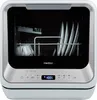 A white countertop dishwasher with its door open, showing dishes inside. Produktbild-Vorschau