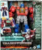 The image shows the packaging of a Transformers Optimus Prime Beast-Mode toy. The packaging displays the toy in its robot mode, along with smaller images showcasing its different modes and features. Text and logos related to the Transformers brand and the  Podgląd zdjęcia produktu