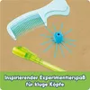 A flat lay of science experiment tools on a brown background with a green overlay at the bottom containing text. Náhled obrázku produktu