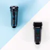 Two Remington shavers are displayed on a split background of light blue and white. Anteprima dell’immagine prodotto