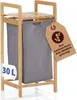 A bamboo laundry basket with a gray fabric liner and a wooden shelf on top. Produktbild-Vorschau