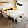 A bed with storage drawers and a headboard with shelves and lighting, set up in a room. Anteprima dell’immagine prodotto