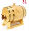 A wooden barrel with a tap and stand, with text indicating its capacity. Voir les images du produit