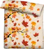 A duvet cover and pillowcase set with a pattern of falling autumn leaves. Produktbild-Vorschau