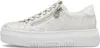 A white sneaker with a platform sole and a zipper detail. Náhľad obrázku produktu