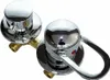 A close-up studio shot of a chrome faucet with two handles against a white background. Produktbild-Vorschau