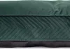 A close-up view of the side of a green dog bed with quilted detailing and a black bottom. Produktbild-Vorschau