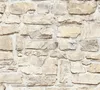 A close-up view of a stone wall texture. Produktbild-Vorschau