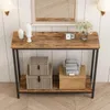 A console table with decorative items and storage boxes on display. Produktbild-Vorschau