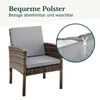 A wicker chair with grey cushions, with a close-up of a zipper on a cushion cover. Produktbild-Vorschau