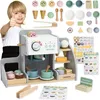 A child is giving a thumbs up next to a wooden coffee and ice cream bar playset. Anteprima dell’immagine prodotto