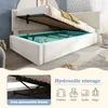A bed with its storage compartment open, showing items inside. The image also includes a close-up of the bed's frame and icons representing storage options. Náhled obrázku produktu