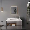A modern bathroom vanity with a sink, faucet, and illuminated mirror. Náhled obrázku produktu