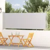 A patio scene with a retractable side awning, a table, and chairs. Anteprima dell’immagine prodotto