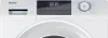 Close-up of the control panel and top section of a white washing machine. Produktbild-Vorschau