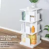 A white rotating bookshelf with books and decorative items on a wooden floor and light gray wall background. Podgląd zdjęcia produktu