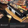 A close-up shot of a raclette grill with food being cooked and cheese melting. Produktbild-Vorschau
