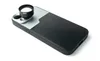 A black phone case with a silver accent is shown with a lens attachment on the camera area. Podgląd zdjęcia produktu