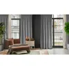 A living room scene with a chair, ottoman, and curtains. Produktbild-Vorschau