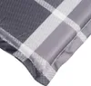 A close-up view of a folded grey plaid cushion or mattress topper. Produktbild-Vorschau