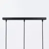A black linear pendant light fixture with three wires hanging down against a white background. Podgląd zdjęcia produktu