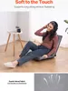 A woman is sitting on a floor chair, wearing headphones and listening to music. There is a small side table with a plant and a mug next to her. The image also includes a close-up of the fabric. Voir les images du produit