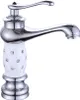 A close-up studio shot of a single bathroom faucet. Podgląd zdjęcia produktu